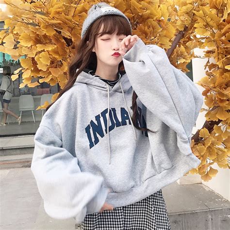 korean girl wearing oversized hoodie.